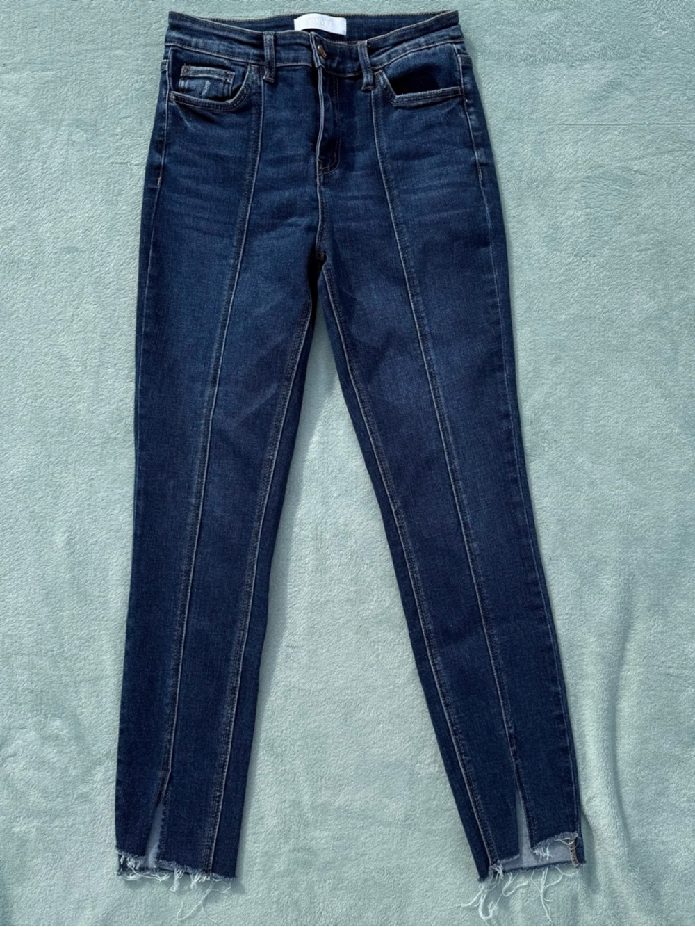 Vervet High Rise Ankle Skinny Jeans with Step Hem Detail
